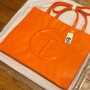Telfar Medium Shopper Bag orange vegan leather